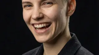 AI generated photorealistic portrait of a laughing person