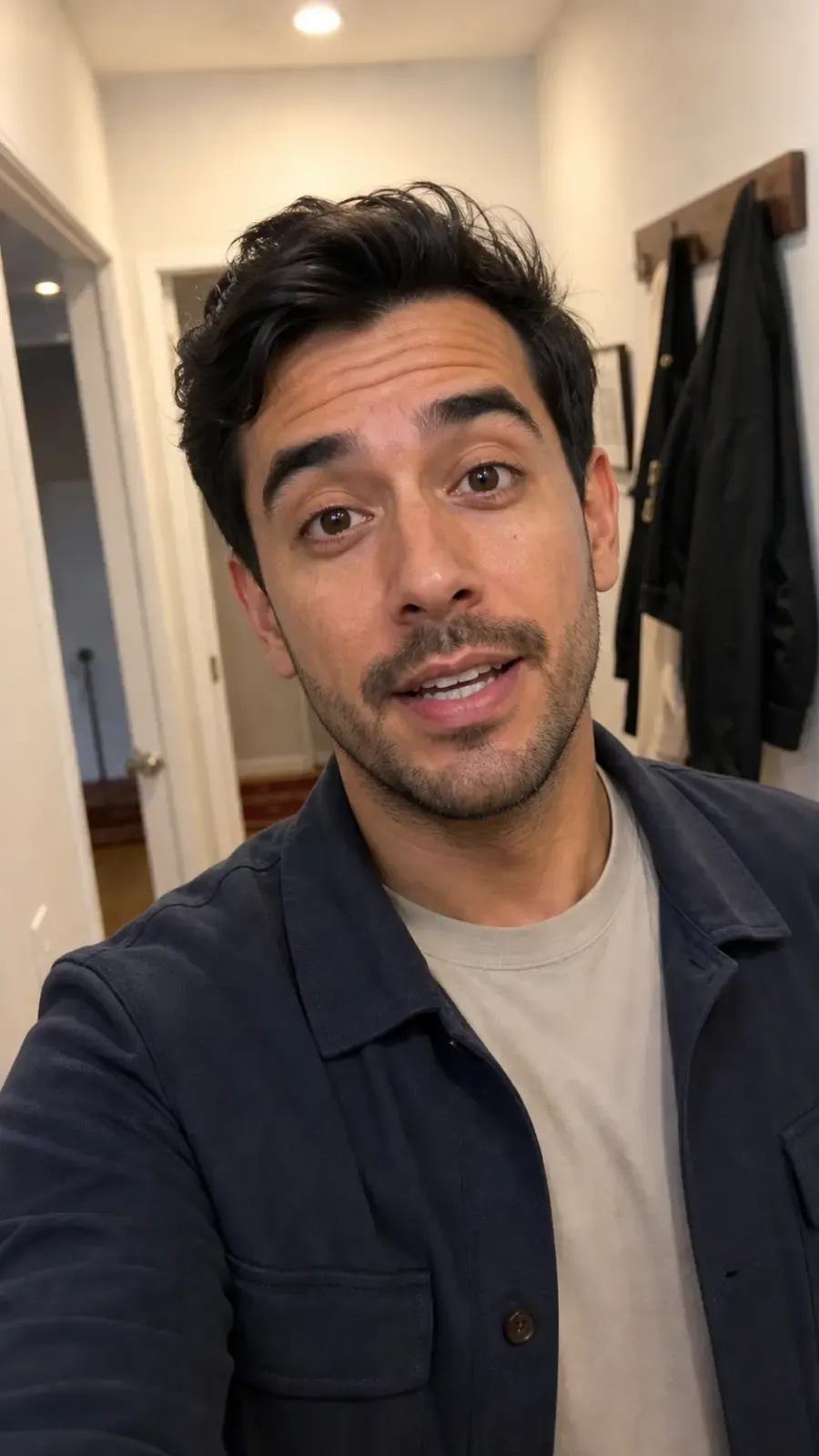 Realistic AI avatar reference in hallway selfie framing
