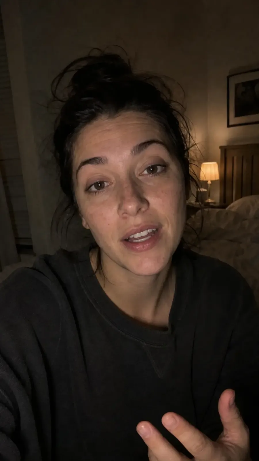 Realistic AI avatar reference with low-light homemade selfie framing