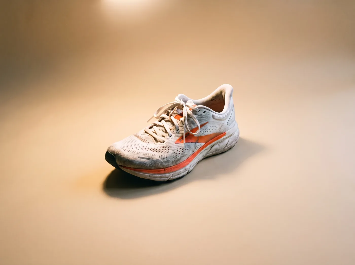 Same sneaker on a clean studio backdrop after AI background replacement